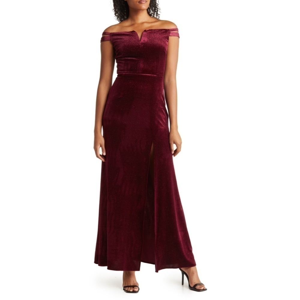 Soft velvet brings textural style to this cold-shoulder dress accented with a sp